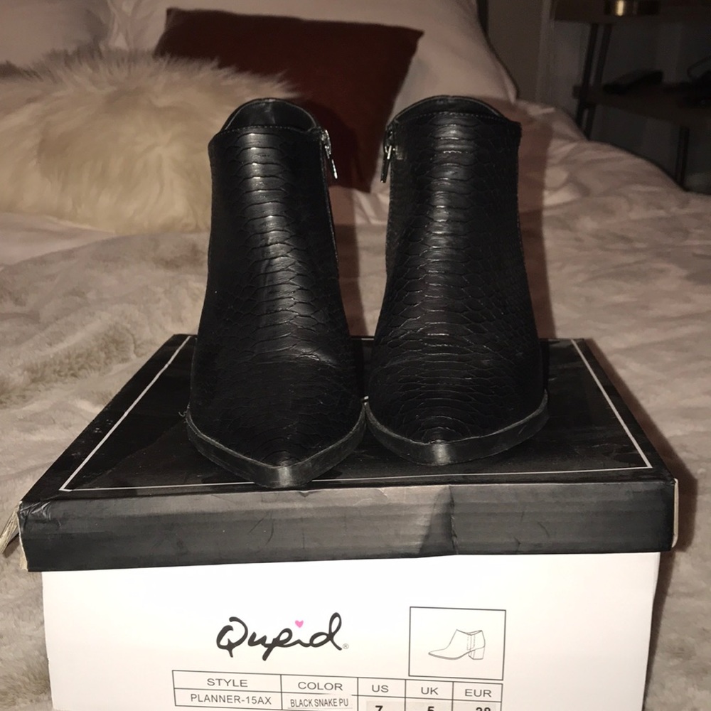 Snakeskin ankle bootie